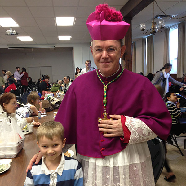 Mark and Catherine's youngest son. Gregory, with Kazakhstani Bishop Athanasius Schneider